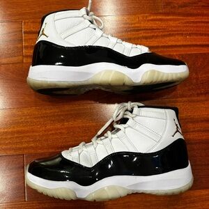 Air Jordan 11 "Gratitude" Black and White Concord Sneakers